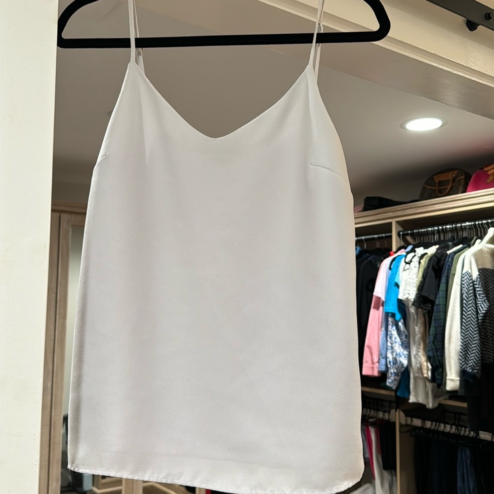 Banana Republic size Small adjustable strap white tank top. Perfect for suits.